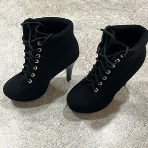 Black platform heeled boots